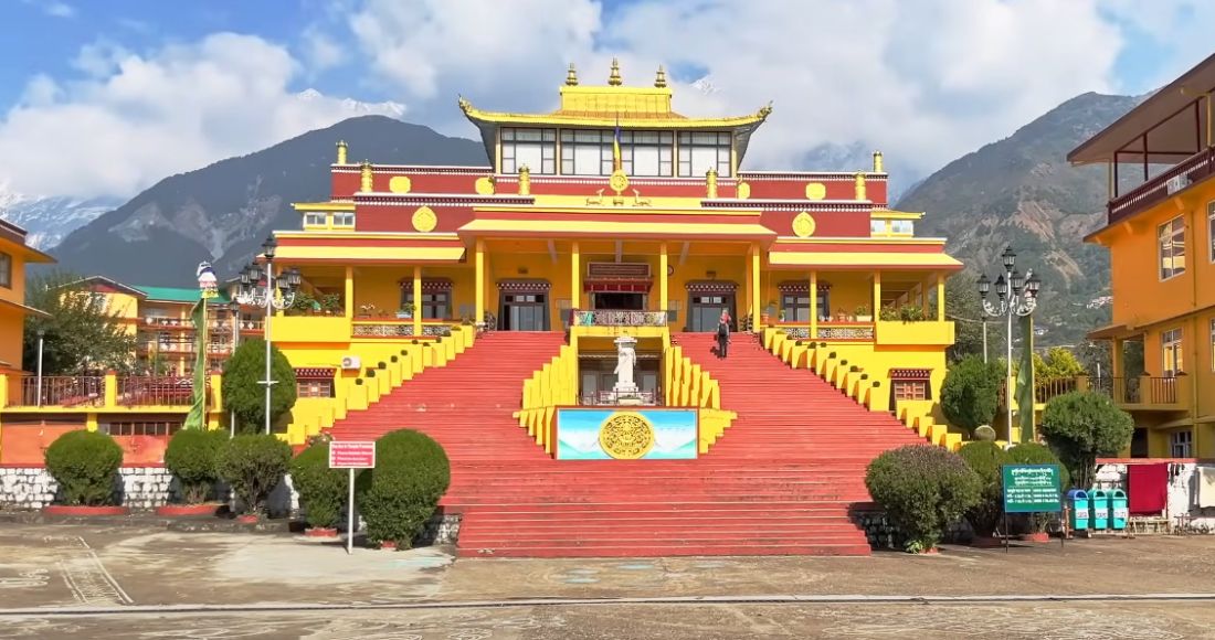 Dharamshala Travel Guide, Scenic view of Dharamshala town with Tibetan monastery and snow-covered Dhauladhar mountains in the background